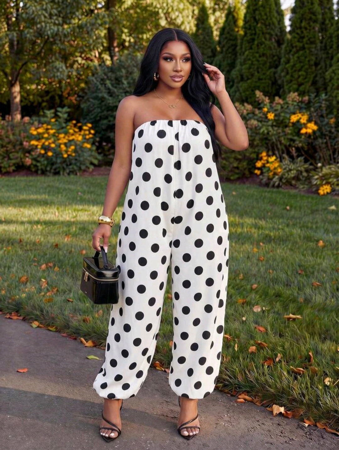 Sleeveless Black And White Polka Dot Jumpsuit UK-16